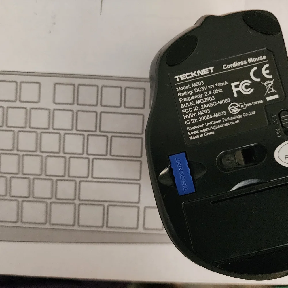 Wireless Keyboard Is Black andTECK NET Mouse Is Black and Purple U Get Both